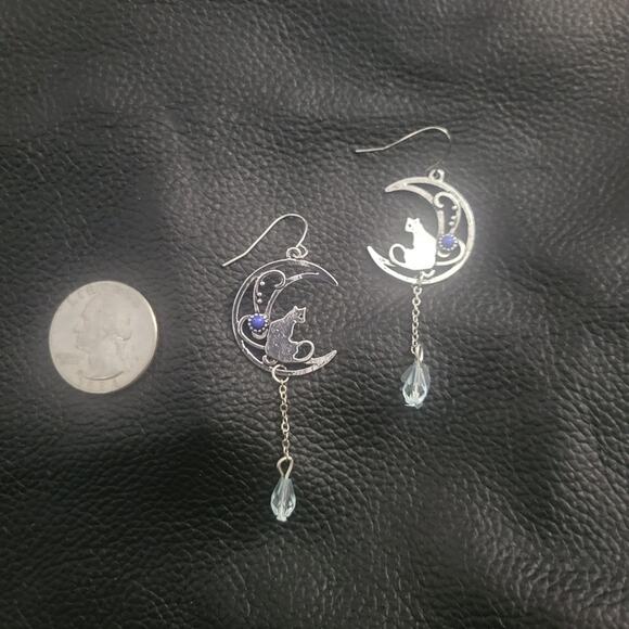 Cat sitting on crescent moon blue & silver tone dangle hook earrings - Picture 2 of 2